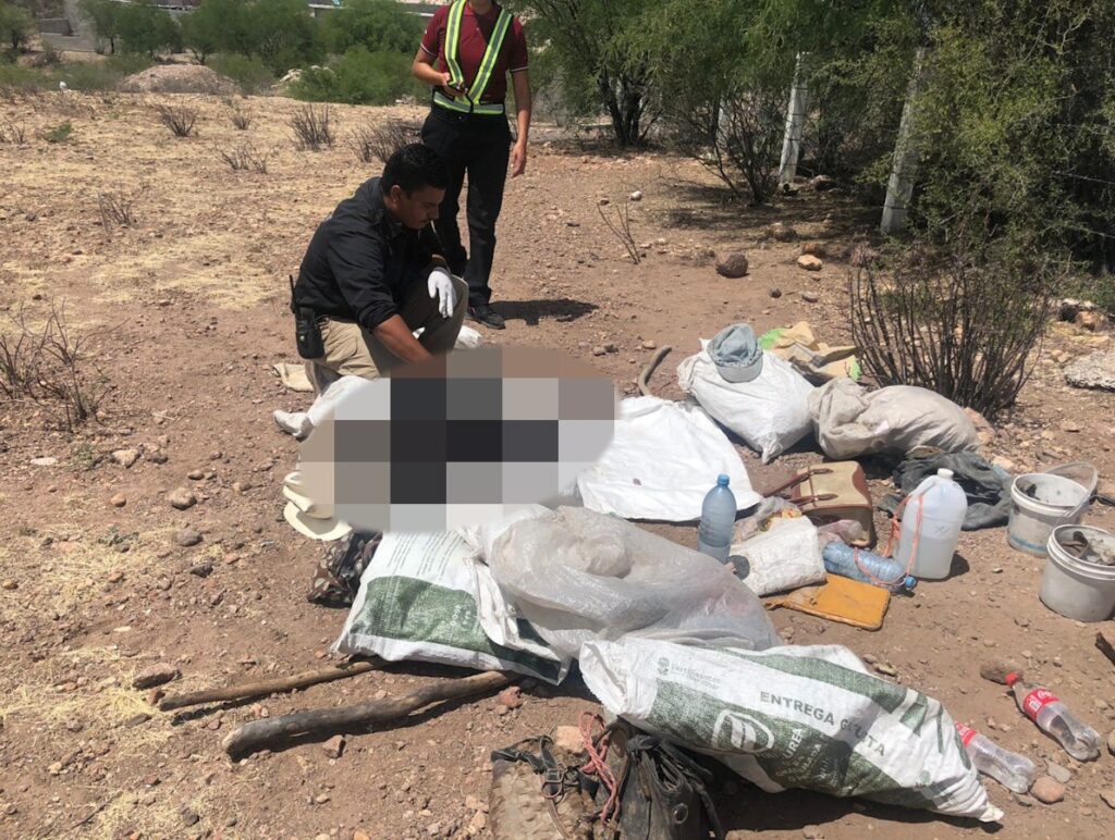 Encontraron cadáver entre costales de basura