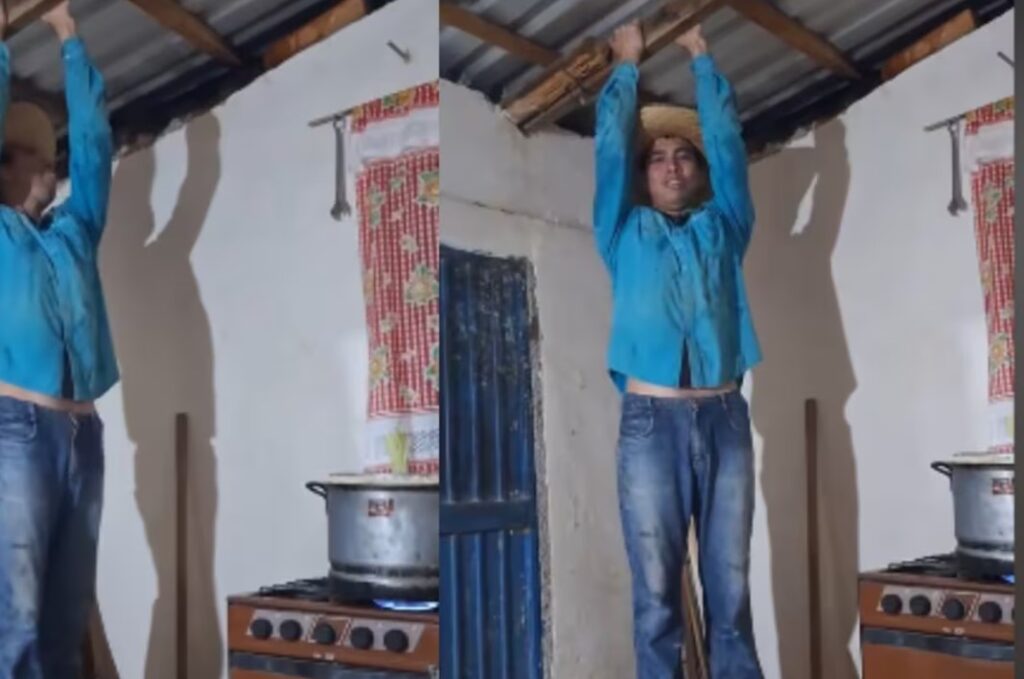 Hombre se cuelga del techo para proteger su hogar